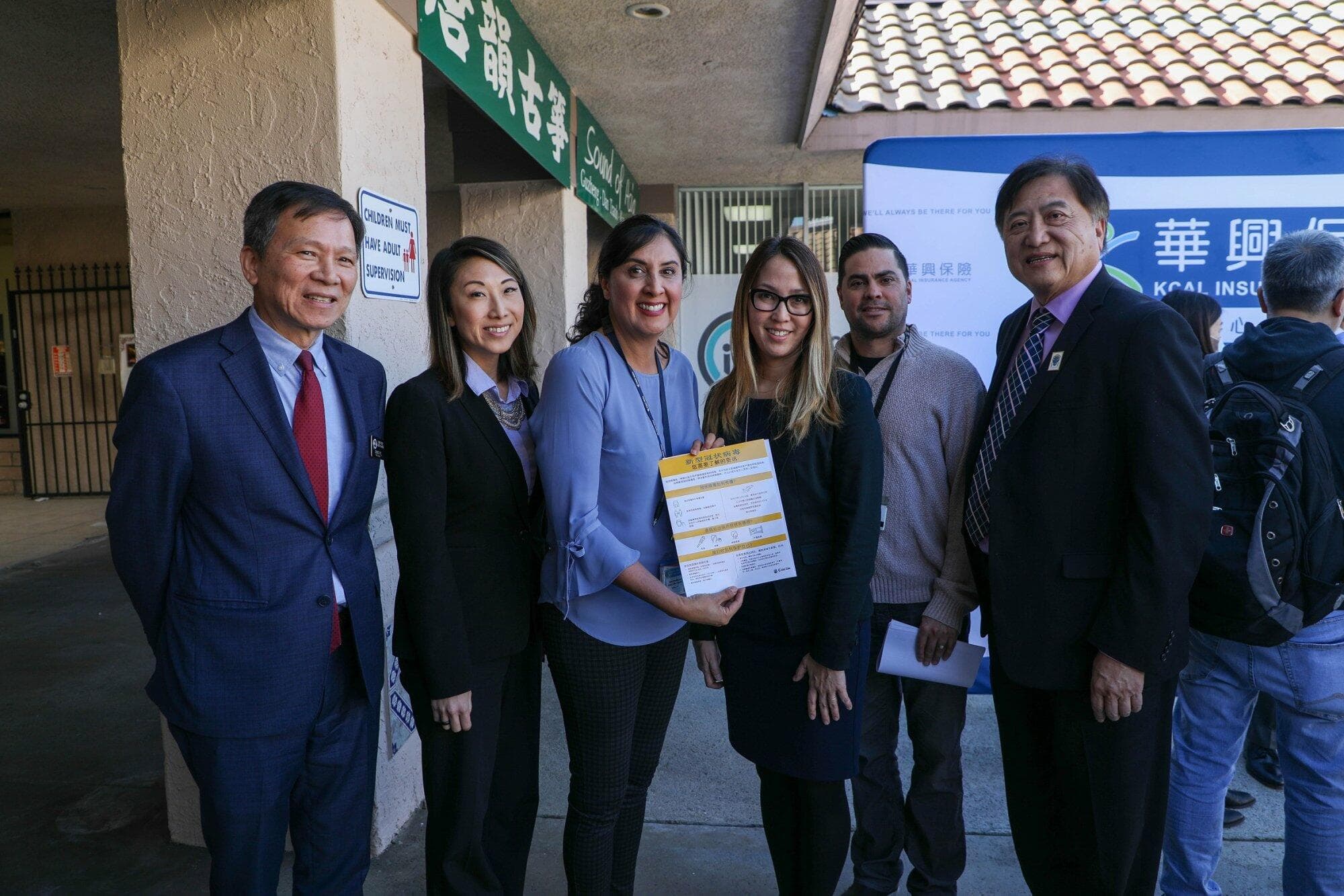 Speakers and KCAL hosts pose outside the 2020 Seminar for Business Owners