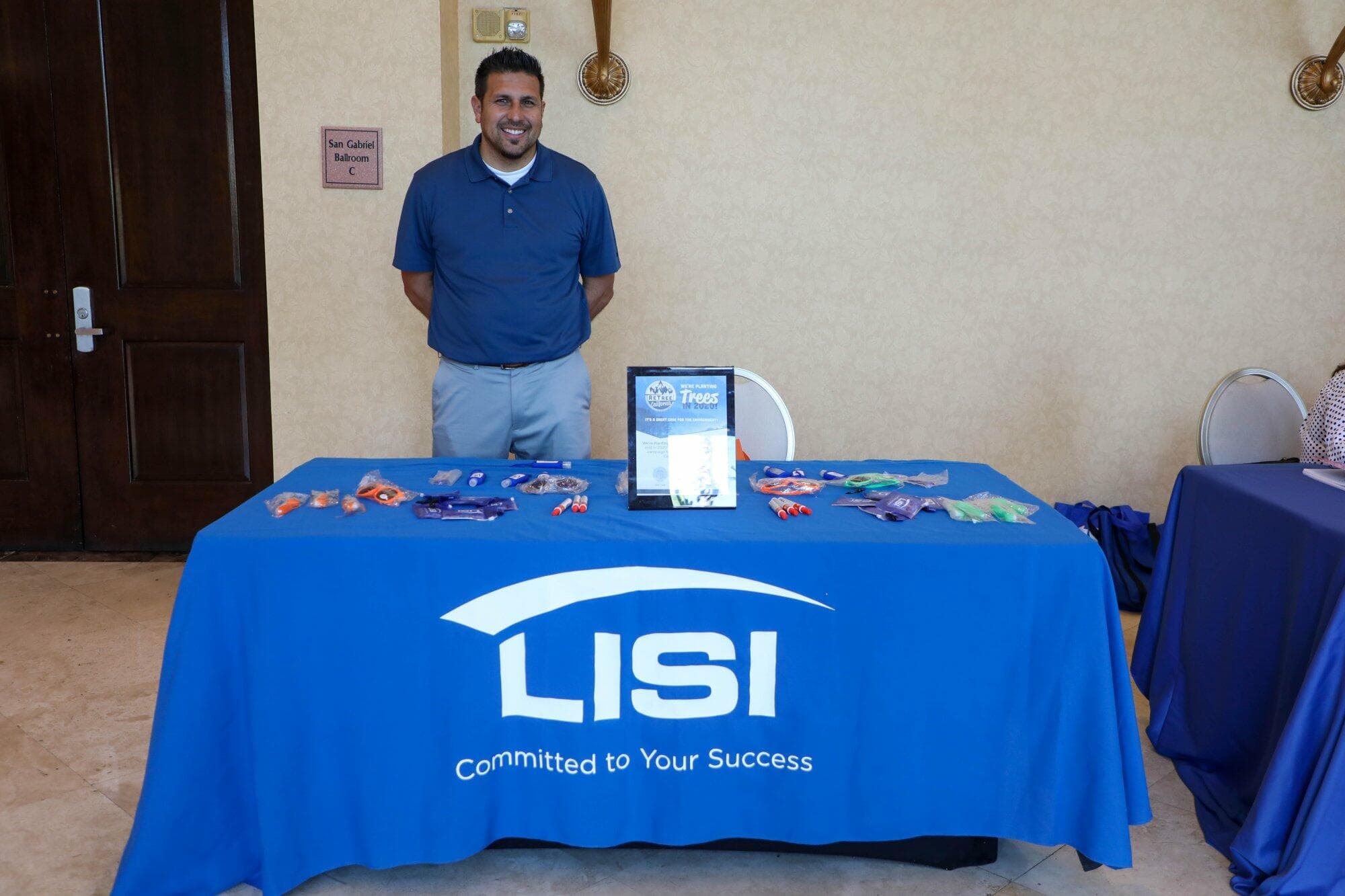 A LISI representative at the company's exhibitor table at the 2020 Business Owners Seminar