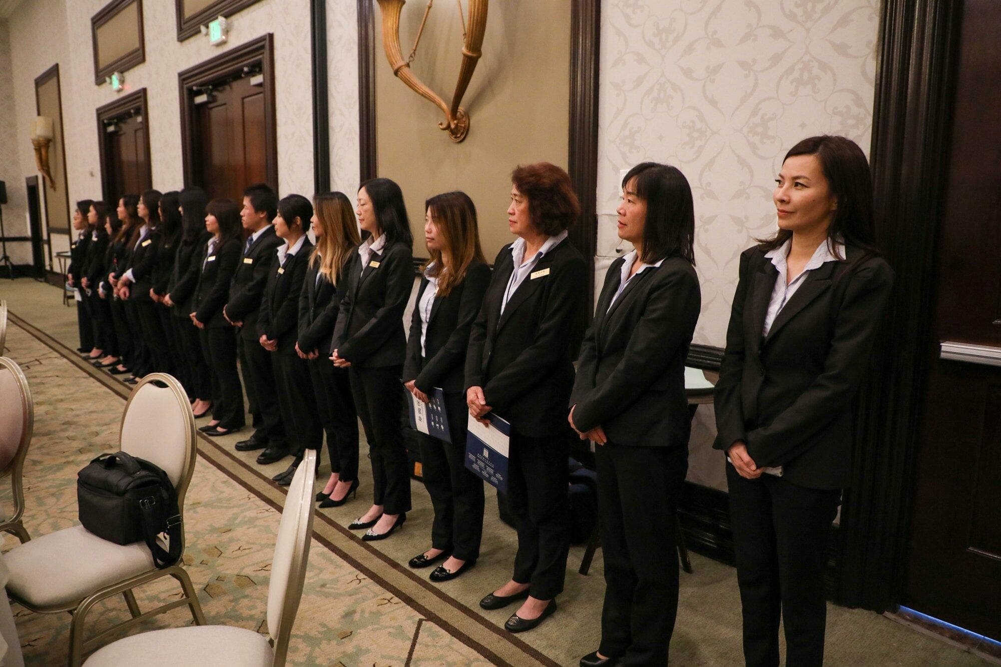 KCAL staff line up to welcome guests at the 2020 Business Owners Seminar in San Gabriel