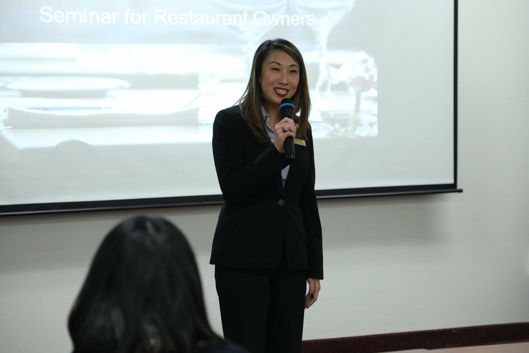 KCAL Insurance Agency CSO Angela Chang speaks at the seminar for restaurant owners
