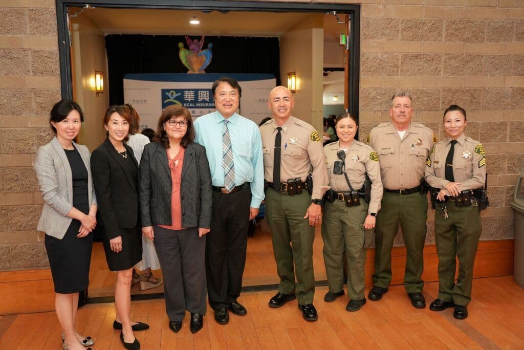 Kcal CEO Kenny Chang, Chang and Cote members and 4 police officers