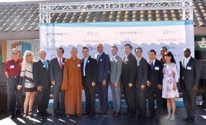 Elected officials, community leaders and KCAL President Kenny Chang at the Covered California bus tour stop
